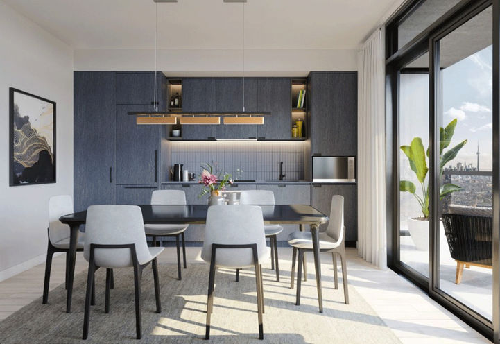 View of Suite Kitchen and Dining Area with Table at Galleria 02 Condos