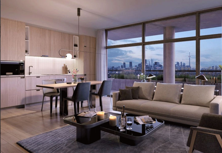 View of Suite with Seating Area, Kitchen and Table with City Views