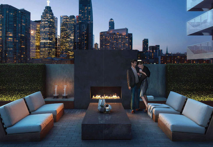 Outdoor Terrace with Fireplace at Prestige Condos