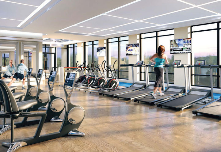 Edge Towers Fitness Room With Large Windows and Treadmills