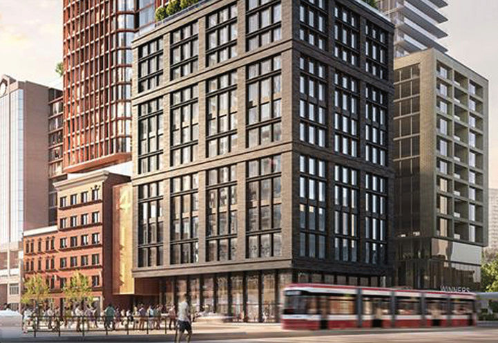 Podium View of 411 King Street Condos With Street Car and Podium Shops