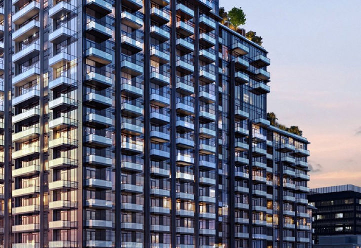 75 James Condos Exterior View of Balconies at Dusk