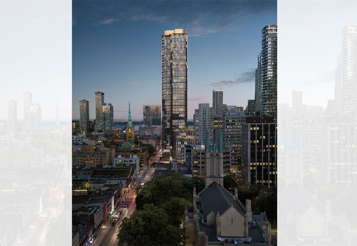 ALiAS Condos Tower at Dusk Against Skyline