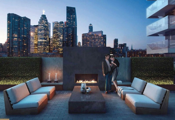 SkyTower Condos Terrace at Dusk With Toronto Skyline in Background