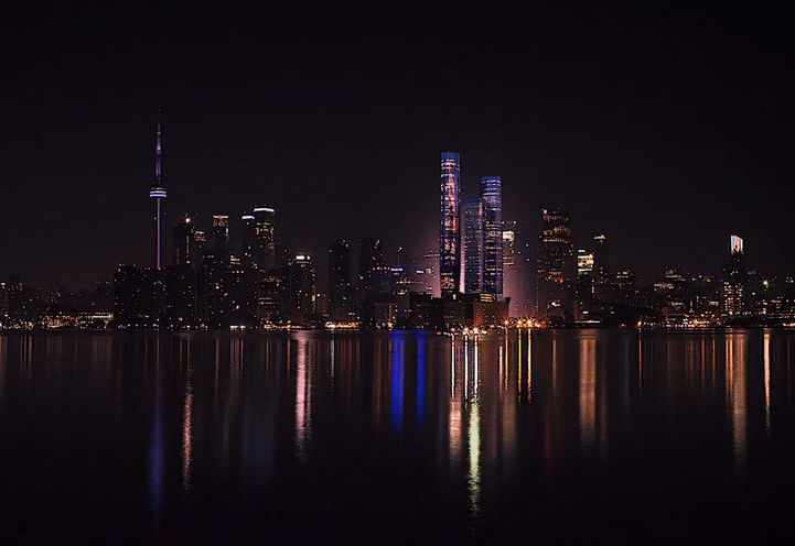 View of SkyTower Condos Among the City Lights at the Dead of Night
