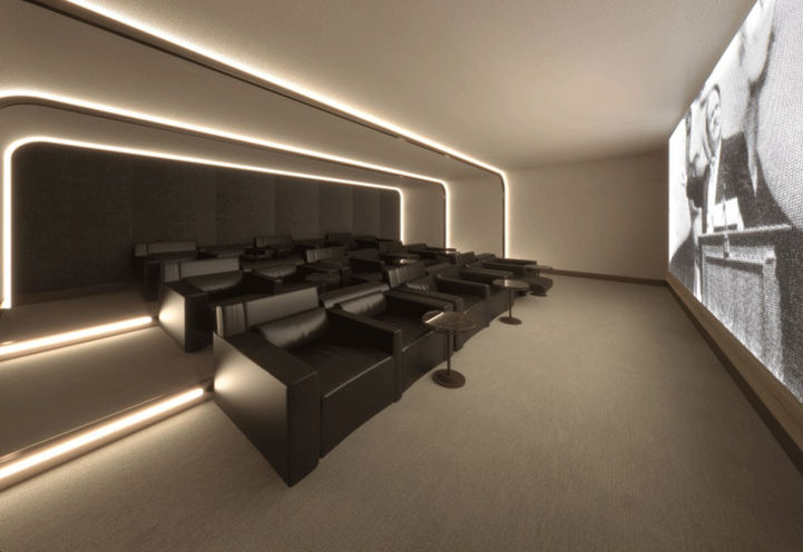 Big Screen Theatre Room with Comfy Chairs and Side Tables
