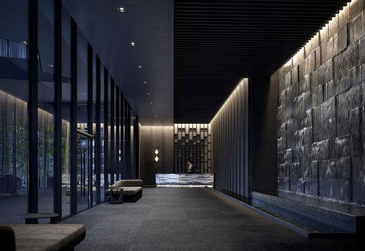 Resident's Lobby made up of deep charcoal stone features with Concierge Untitled Toronto